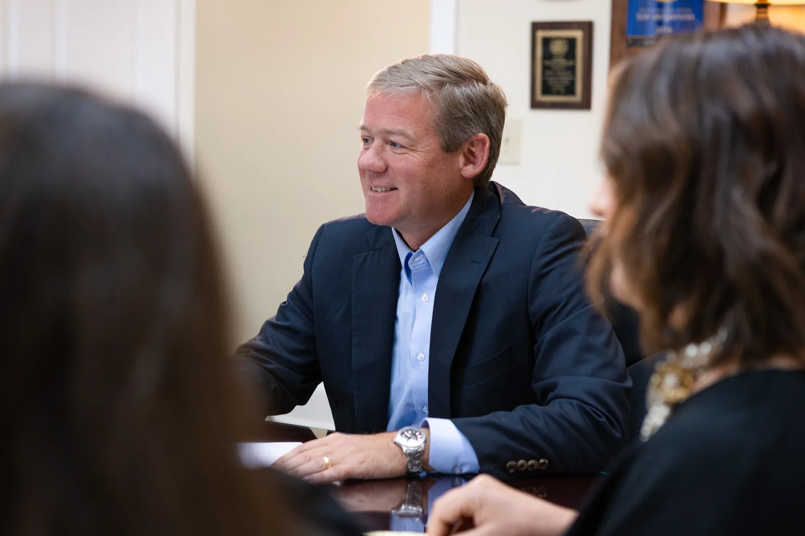 John B. Jackson meeting with a client